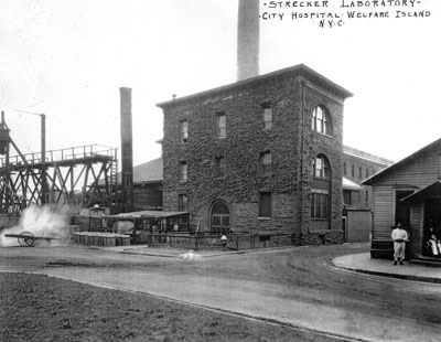 Strecker Memorial Laboratory, a small brick and stone Romanesque Revival building.