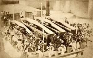 Four nuns in open coffins at St Francis of Assisi Church, Stratford (Photo by local photographer Henry Friedmann)